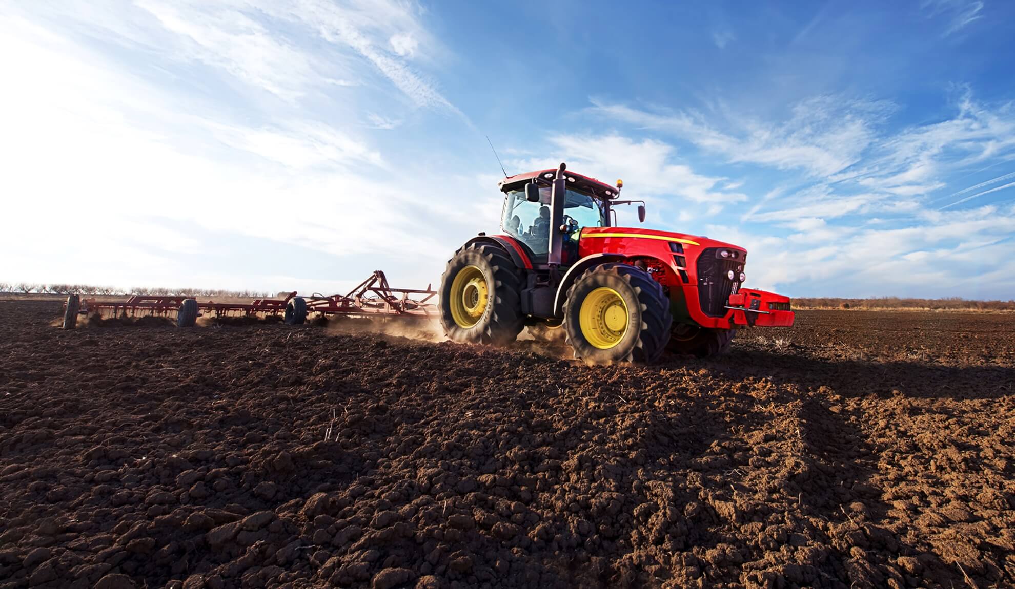 Versatile Tractor with Disk Till Attachment